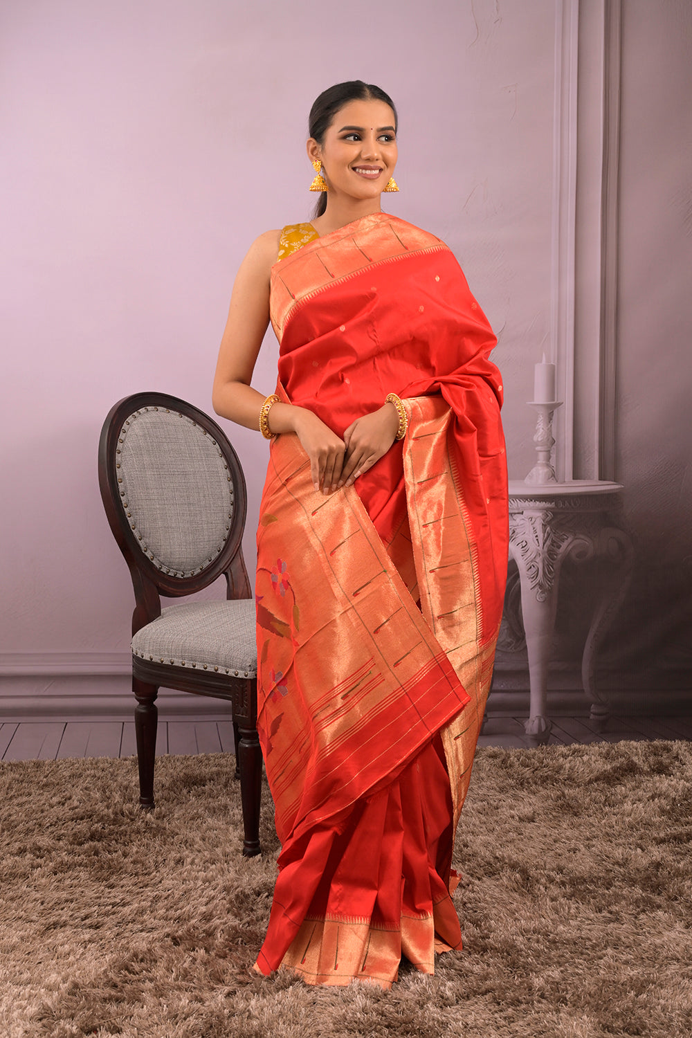 Paithani Woven Gold Jari Motifs With Single Muniya Border