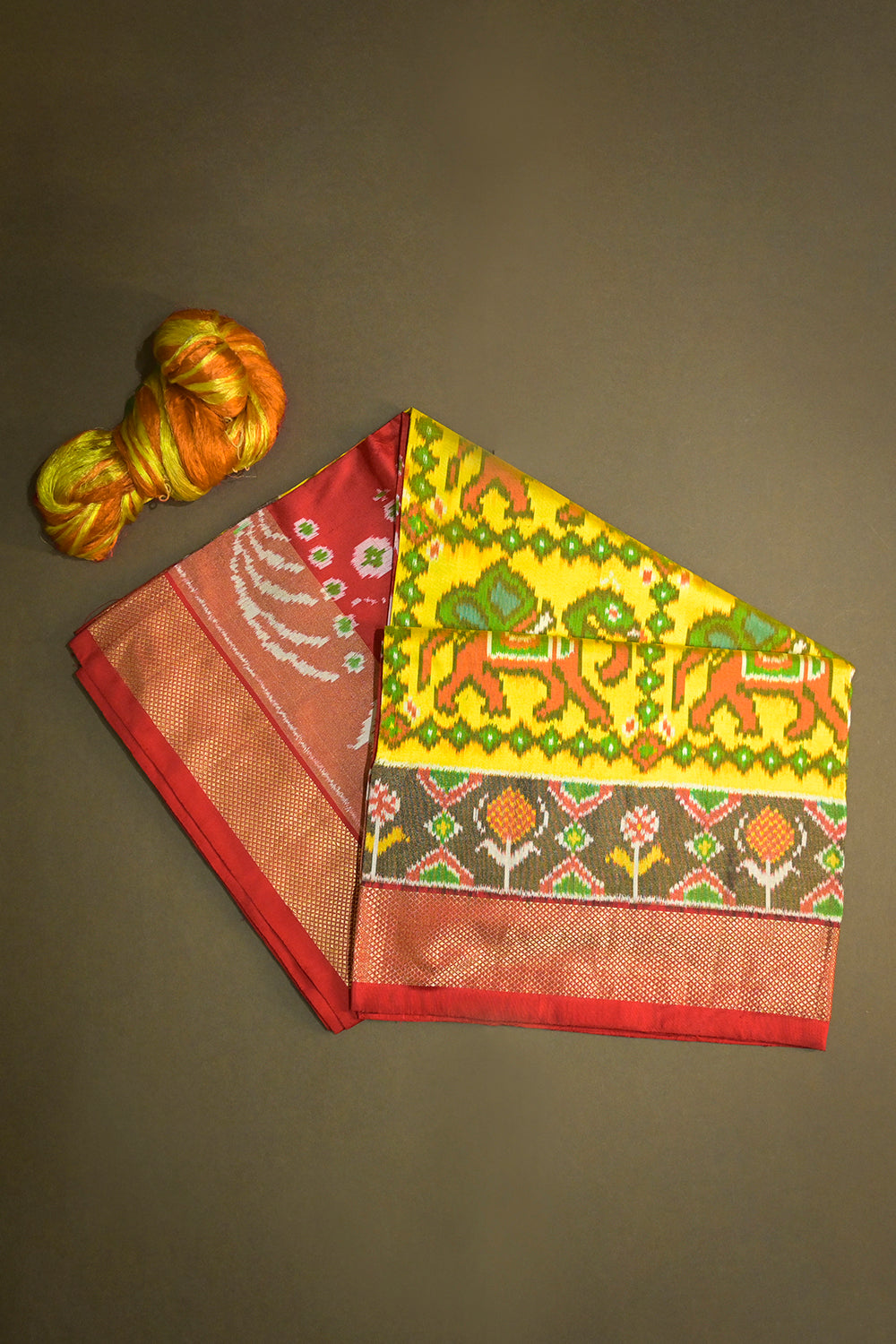 Ikkat Patola Tie And Dye Weave With Animal Print Weaving