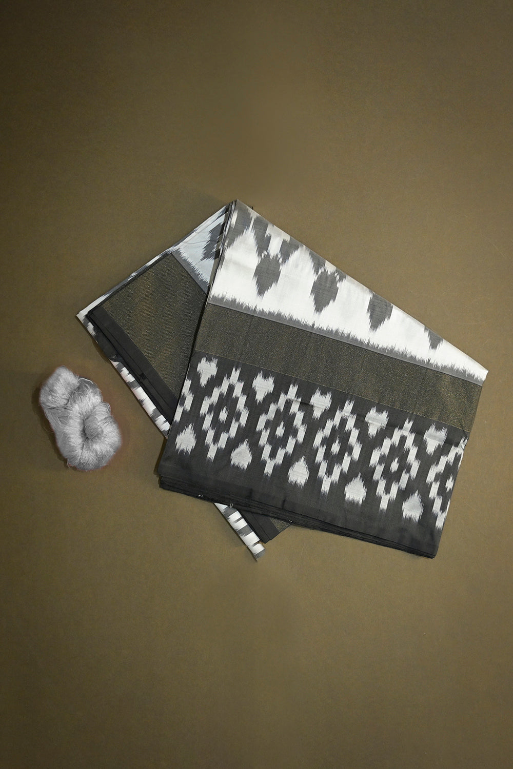 Ikkat Patola Tie And Dye Weave With Black Contrast