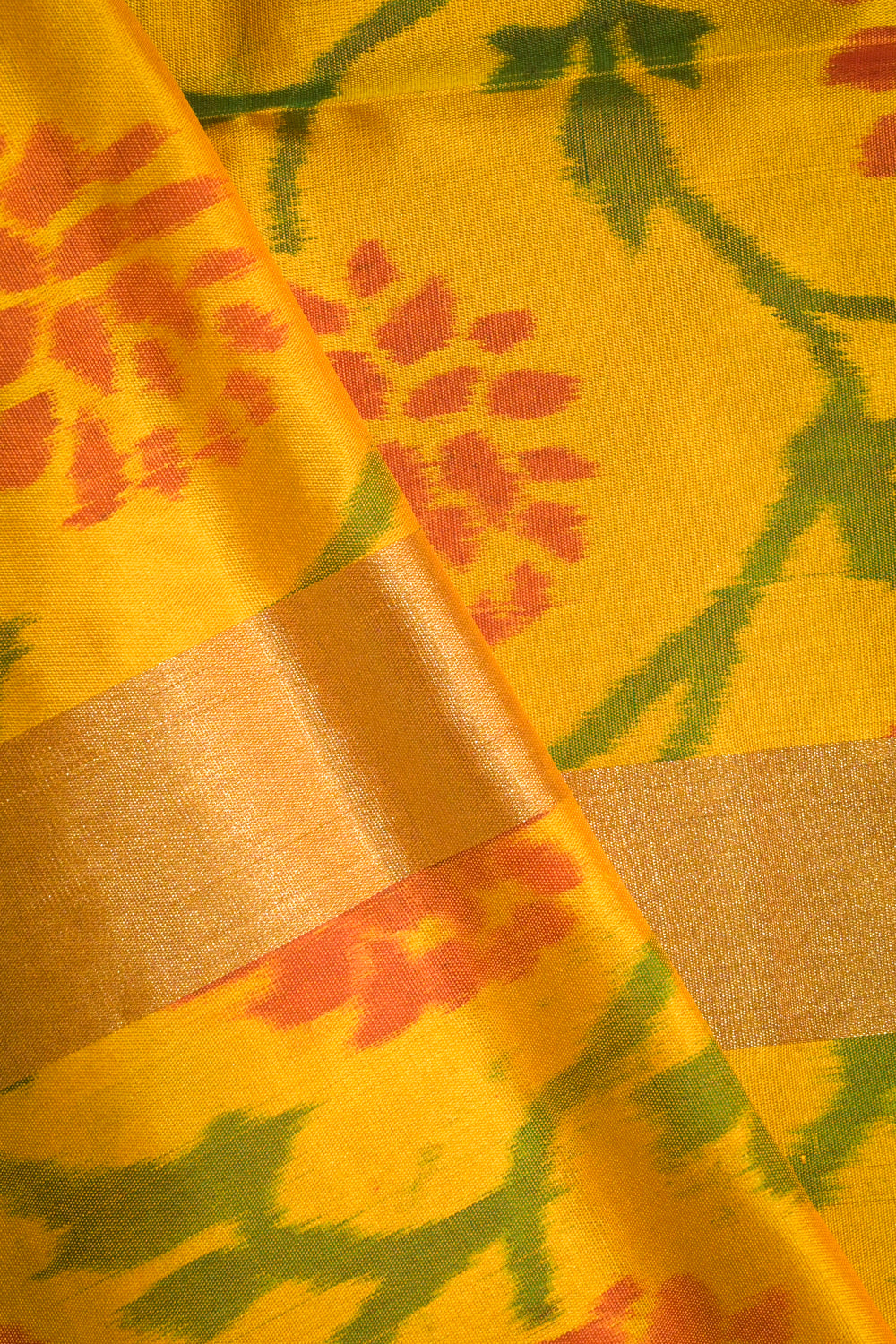 Soft Silk Woven Jari Motifs With Contrast Tie And Dye Weave