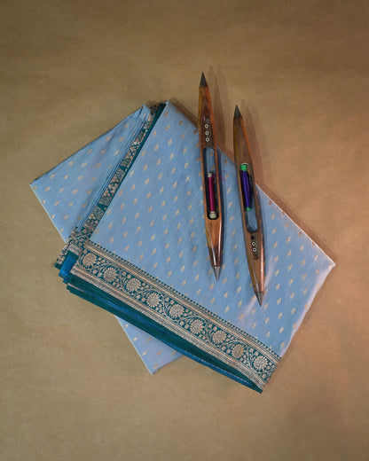Pastel blue Banarasi Silk Saree with Rama Contrast & Woven Chunri Buttis